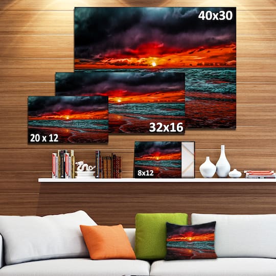 Designart - Red Sunset over Blue Waters